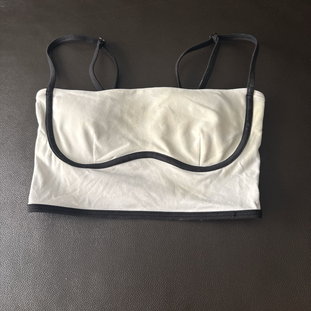 ALO Yoga Cream and Black Bralette